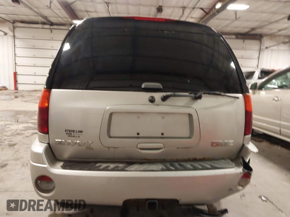 2005 GMC Envoy SLE with VIN 1GKET16S656102522, listed as a IAAI auction lot 41729310 with 233,049 mi miles. Bid and sale history available at carsss.com. Image 17.