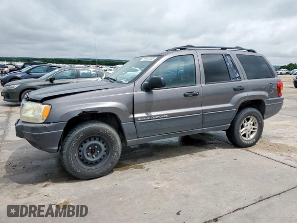 2003 Jeep Grand Cherokee Laredo with VIN 1J4GW48SX3C569087, listed as a Copart auction lot 55941035 with Not provided miles and Salvage title. Bid and sale history available at DreamBid. Image 1.