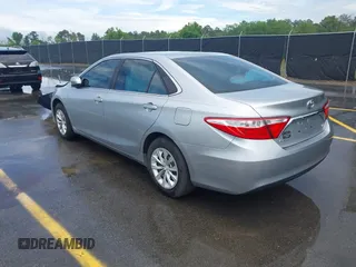 2015 Toyota Camry XLE with VIN 4T4BF1FK4FR483890, listed as a IAAI auction lot 42088503 with 189,058 mi miles and . Bid and sale history available at DreamBid. Image 3.