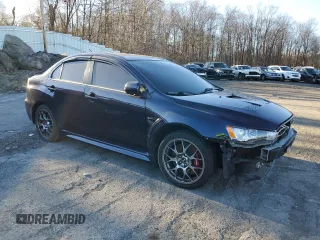 2014 Mitsubishi Lancer Evolution MR with VIN JA32W5FV8EU014461, listed as a Copart auction lot 87376384 with 0 mi miles and Salvage Title. Bid and sale history available at carsss.com. Image 4.