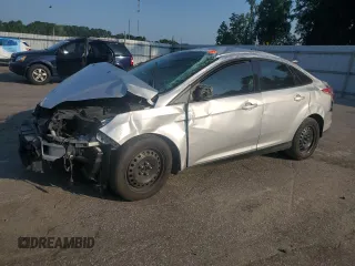 2012 Ford Focus SE with VIN 1FAHP3F20CL211460, listed as a Copart auction lot 62668645 with 151,334 mi miles and Salvage title. Bid and sale history available at DreamBid. Image 1.