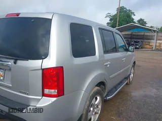 2015 Honda Pilot EX-L with VIN 5FNYF4H5XFB014653, listed as a IAAI auction lot 42121003 with 152,912 mi miles and . Bid and sale history available at carsss.com. Image 4.