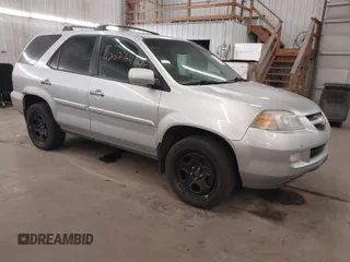 2006 Acura MDX Touring w/Navi with VIN 2HNYD18856H545679, listed as a IAAI auction lot 42026404 with 164,698 mi miles. Bid and sale history available at carsss.com. Image 1.