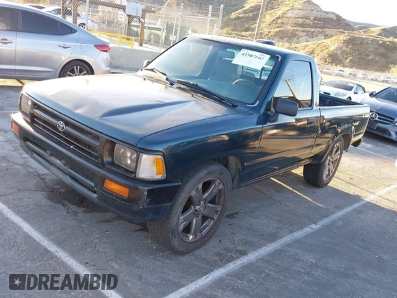 1994 Toyota Pickup with VIN JT4RN81A2R5194383, listed as a IAAI auction lot 41587661 with 262,153 mi miles and . Bid and sale history available at DreamBid. Image 2.