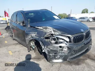 2016 BMW X5 M with VIN 5YMKT6C51G0R79331, listed as a IAAI auction lot 40590865 with 80,772 mi miles. Bid and sale history available at carsss.com. Image 1.