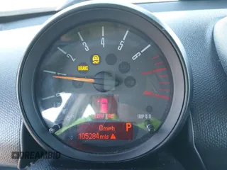 2016 MINI Countryman S with VIN WMWZC5C50GWU02754, listed as a IAAI auction lot 42702055 with 105,284 mi miles and . Bid and sale history available at DreamBid. Image 7.