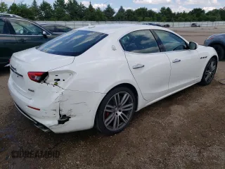 2019 Maserati Ghibli S Q4 GranLusso with VIN ZAM57YTL4K1312711, listed as a Copart auction lot 63291414 with 24,467 mi miles and Salvage Title. Bid and sale history available at carsss.com. Image 3.
