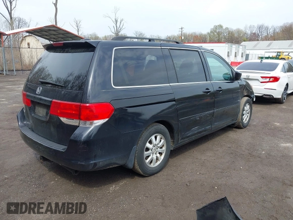 2009 Honda Odyssey EX-L with VIN 5FNRL387X9B051750, listed as a IAAI auction lot 41953221 with 205,142 mi miles. Bid and sale history available at carsss.com. Image 4.