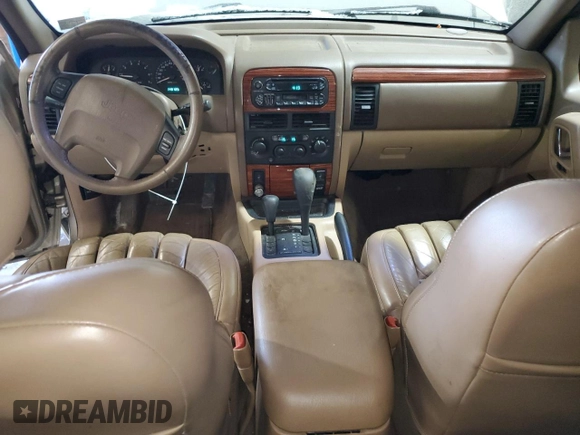 1999 Jeep Grand Cherokee Limited with VIN 1J4GW68N3XC799663, listed as a Copart auction lot 45630695 with 149,125 mi miles and Salvage Title. Bid and sale history available at carsss.com. Image 8.
