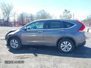 2014 Honda CR-V EX with VIN 2HKRM4H50EH628721, listed as a IAAI auction lot 42064143 with 103,009 mi miles and . Bid and sale history available at carsss.com. Image 14.