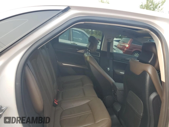 2014 Lincoln MKZ Hybrid z VIN 3LN6L2LU5ER823084, wystawiony jako Copart lot #59597565 z przebiegiem 126 402 mil mil oraz Szkoda całkowita • Salvage title. Historia ofert i sprzedaży dostępna na DreamBid. Obrazek 10.