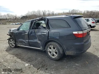 2013 Dodge Durango Crew with VIN 1C4RDJDG5DC686694, listed as a Copart auction lot 52766305 with 152,271 mi miles and Salvage Title. Bid and sale history available at carsss.com. Image 2.