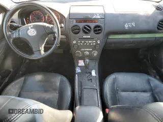 2005 Mazda 6 Sport S with VIN 1YVHP80D855M52119, listed as a Copart auction lot 42778265 with 211,422 mi miles and Salvage Title. Bid and sale history available at DreamBid. Image 8.