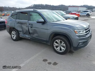 2018 Volkswagen Atlas 3.6L V6 SE with VIN 1V2LR2CA6JC520916, listed as a IAAI auction lot 41124055 with 80,404 mi miles. Bid and sale history available at carsss.com. Image 1.