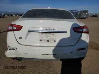 2014 Maserati Ghibli S Q4 z VIN ZAM57RTAXE1092970, wystawiony jako Copart lot #48617585 z przebiegiem 92 976 mil mil oraz Szkoda całkowita • Salvage title. Historia ofert i sprzedaży dostępna na DreamBid. Obrazek 6.