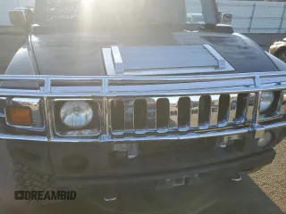 2005 Hummer H2 SUT with VIN 5GRGN22U15H101289, listed as a Copart auction lot 84107974 with 0 mi miles and Salvage Title. Bid and sale history available at carsss.com. Image 11.