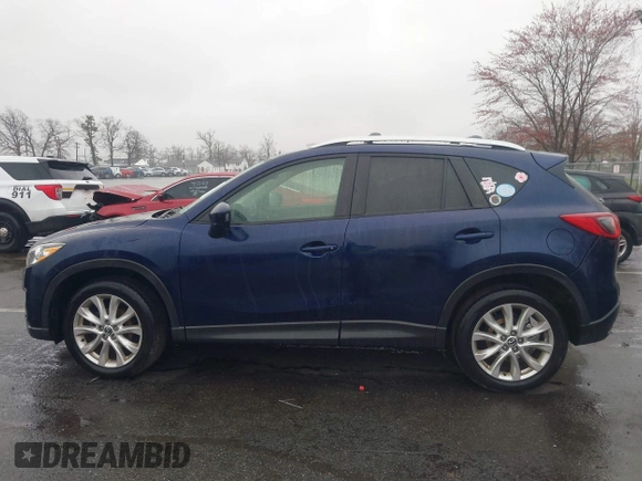 2014 Mazda CX-5 Grand Touring with VIN JM3KE4DY8E0366644, listed as a IAAI auction lot 41971438 with 135,644 mi miles and . Bid and sale history available at carsss.com. Image 14.
