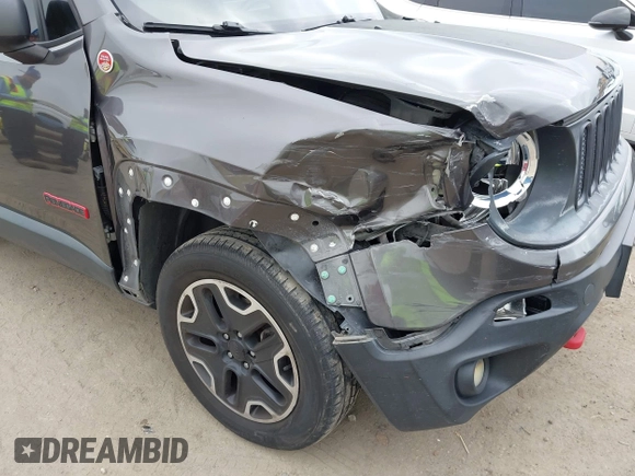 2016 Jeep Renegade Trailhawk with VIN ZACCJBCT0GPD72437, listed as a IAAI auction lot 42180021 with 115,427 mi miles and . Bid and sale history available at carsss.com. Image 6.