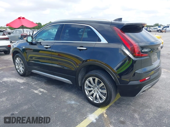 2023 Cadillac XT4 FWD Premium Luxury with VIN 1GYFZCR44PF170452, listed as a IAAI auction lot 42084960 with 22,212 mi miles and . Bid and sale history available at DreamBid. Image 3.