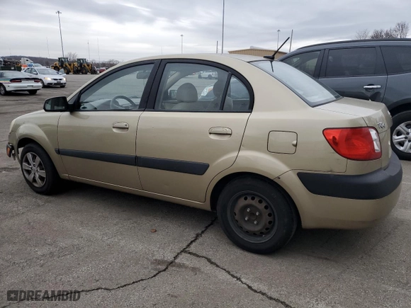 2009 Kia Rio SX with VIN KNADE223796524159, listed as a Copart auction lot 86185964 with 157,061 mi miles and Salvage Title. Bid and sale history available at carsss.com. Image 2.