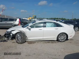 2016 Lincoln MKZ z VIN 3LN6L2G98GR618707, wystawiony jako IAAI lot #42569269 z przebiegiem 159 545 mil mil oraz . Historia ofert i sprzedaży dostępna na DreamBid. Obrazek 15.