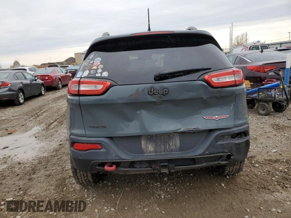 2014 Jeep Cherokee Trailhawk z VIN 1C4PJMBS8EW239981, wystawiony jako Copart lot #80226054 z przebiegiem 161 750 mil mil oraz Czysty tytuł • Clean title. Historia ofert i sprzedaży dostępna na DreamBid. Obrazek 6.