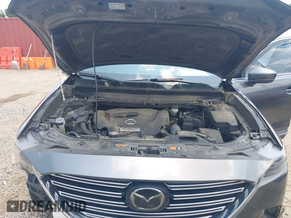 2018 Mazda CX-9 Grand Touring with VIN JM3TCADY7J0217595, listed as a IAAI auction lot 42381331 with 130,604 mi miles and . Bid and sale history available at DreamBid. Image 10.