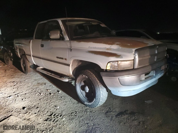1996 Dodge Ram 1500 with VIN 3B7HF13Y7TG127854, listed as a Copart auction lot 83703544 with 197,430 mi miles and Salvage Title. Bid and sale history available at carsss.com. Image 4.