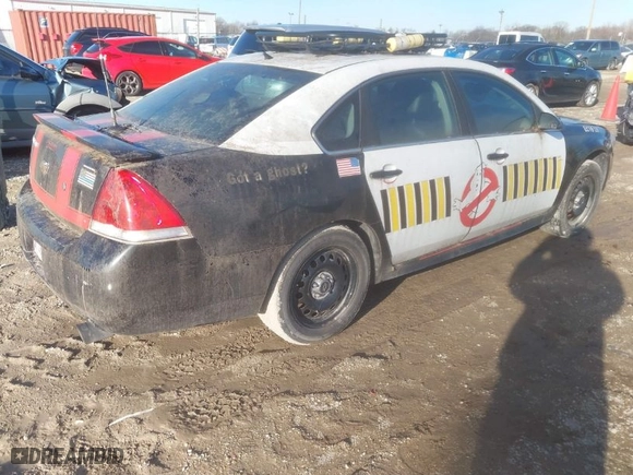 2015 Chevrolet Impala Limited Police Police with VIN 2G1WD5E33F1130102, listed as a IAAI auction lot 41750008 with 92,226 mi miles. Bid and sale history available at carsss.com. Image 4.