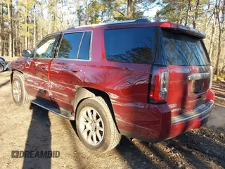2019 GMC Yukon Denali with VIN 1GKS2CKJ8KR137636, listed as a IAAI auction lot 41264171 with 153,136 mi miles. Bid and sale history available at carsss.com. Image 3.