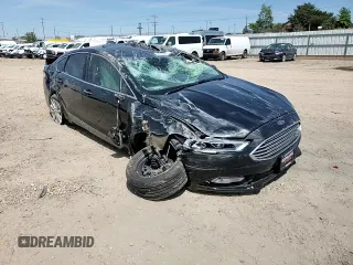 2017 Ford Fusion Hybrid SE с VIN 3FA6P0LU4HR252582, выставлен на аукционе Copart как лот 57965815 с пробегом Не указан миль и Списание • Salvage title. История ставок и продаж доступна на DreamBid. Изображение 13.