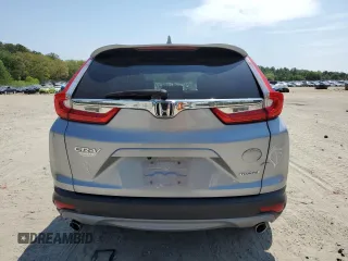 2018 Honda CR-V Touring with VIN 7FARW1H9XJE001467, listed as a Copart auction lot 55222005 with 65,611 mi miles and Salvage title. Bid and sale history available at DreamBid. Image 6.