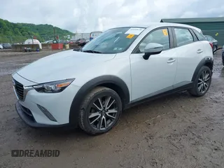 2017 Mazda CX-3 Touring z VIN JM1DKFC7XH0141919, wystawiony jako IAAI lot #42333679 z przebiegiem 93 234 mil mil oraz . Historia ofert i sprzedaży dostępna na DreamBid. Obrazek 2.