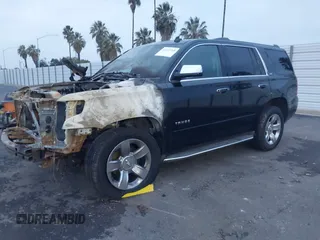 2015 Chevrolet Tahoe LTZ z VIN 1GNSKCKC5FR213209, wystawiony jako IAAI lot #41023368 z przebiegiem Nie podano mil oraz . Historia ofert i sprzedaży dostępna na DreamBid. Obrazek 16.