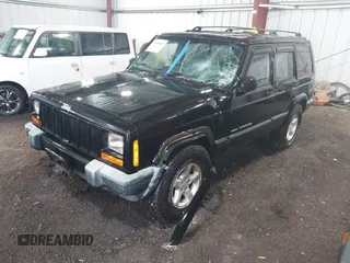 2000 Jeep Cherokee z VIN 1J4FF48S8YL216995, wystawiony jako IAAI lot #42126841 z przebiegiem 178 000 mil mil oraz . Historia ofert i sprzedaży dostępna na DreamBid. Obrazek 2.