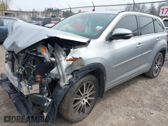 2018 Toyota Highlander SE with VIN 5TDJZRFH3JS903348, listed as a IAAI auction lot 42132056 with 115,384 mi miles and . Bid and sale history available at DreamBid. Image 2.