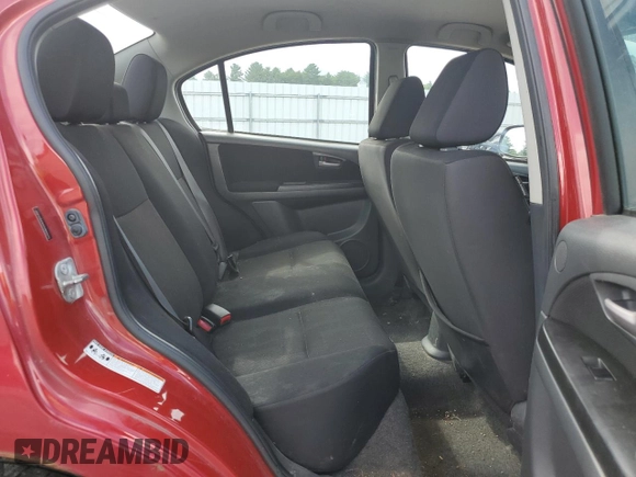 2012 Suzuki SX4 LE with VIN JS2YC5A34C6300079, listed as a Copart auction lot 68414434 with 111,661 mi miles and Salvage Title. Bid and sale history available at carsss.com. Image 11.