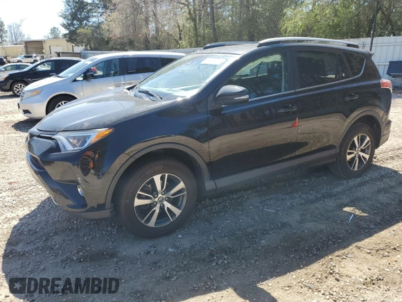 2018 Toyota RAV4 XLE with VIN 2T3WFREV7JW412348, listed as a Copart auction lot 49973215 with 127,661 mi miles and Salvage Title. Bid and sale history available at DreamBid. Image 1.