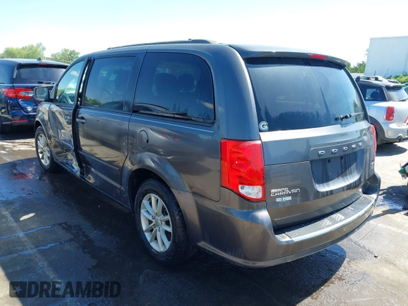 2015 Dodge Grand Caravan SXT with VIN 2C4RDGCG4FR631362, listed as a IAAI auction lot 42027066 with 149,599 mi miles and . Bid and sale history available at DreamBid. Image 3.