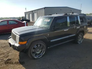 2010 Jeep Commander Limited with VIN 1J4RG5GT1AC129682, listed as a Copart auction lot 55215375 with 36,906 mi miles and Salvage title. Bid and sale history available at DreamBid. Image 1.
