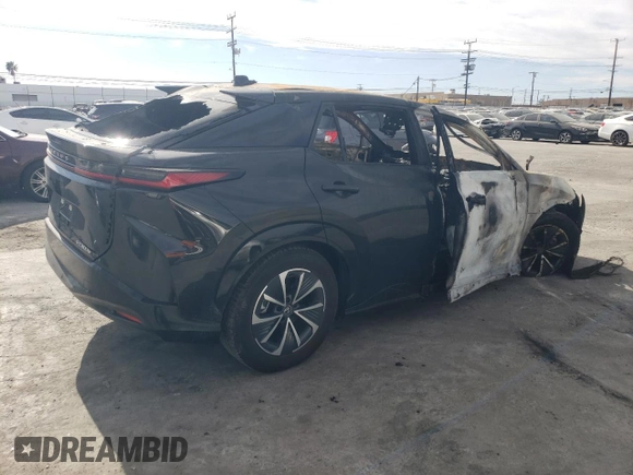 2024 Lexus RZ 300e Premium z VIN JTJABABB0RA004671, wystawiony jako Copart lot #57287935 z przebiegiem Nie podano mil oraz Nie do naprawy • Non repairable. Historia ofert i sprzedaży dostępna na DreamBid. Obrazek 3.