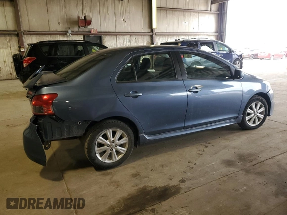 2009 Toyota Yaris z VIN JTDBT903191338190, wystawiony jako Copart lot #54235275 z przebiegiem 90 821 mil mil oraz Szkoda całkowita • Salvage title. Historia ofert i sprzedaży dostępna na DreamBid. Obrazek 3.