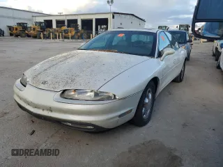1999 Oldsmobile Aurora with VIN 1G3GR62C2X4107973, listed as a Copart auction lot 84023124 with 80,402 mi miles and Non Repairable. Bid and sale history available at DreamBid. Image 1.