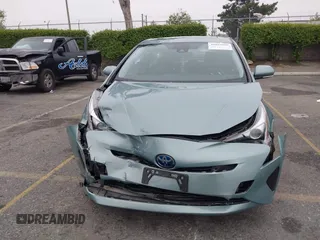 2017 Toyota Prius Two with VIN JTDKARFU7H3052594, listed as a IAAI auction lot 42035969 with 50,789 mi miles and . Bid and sale history available at DreamBid. Image 12.