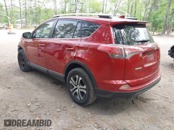 2016 Toyota RAV4 LE with VIN JTMZFREV4GJ062701, listed as a IAAI auction lot 42084694 with 121,553 mi miles and . Bid and sale history available at DreamBid. Image 3.