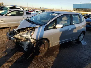 2013 Honda Fit with VIN JHMGE8H31DC082255, listed as a Copart auction lot 76597064 with 214,865 mi miles and Clean Title. Bid and sale history available at carsss.com. Image 1.