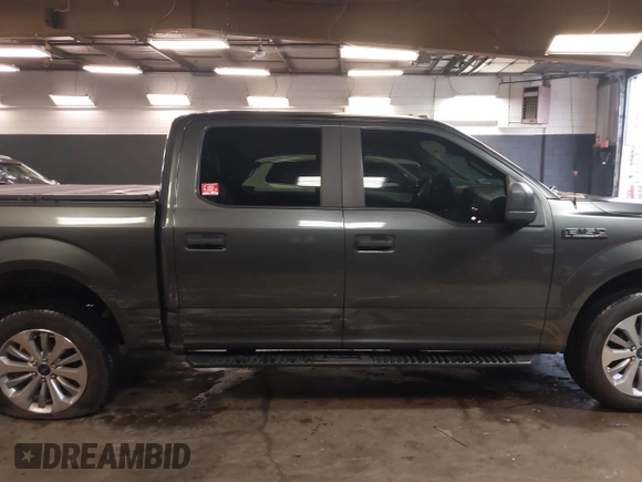 2018 Ford F-150 XL with VIN 1FTEW1EP5JFC37436, listed as a IAAI auction lot 41807561 with 133,159 mi miles and . Bid and sale history available at carsss.com. Image 13.