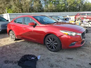 2018 Mazda 3 Touring with VIN 3MZBN1V34JM184390, listed as a Copart auction lot 51583055 with 81,941 mi miles and Salvage Title. Bid and sale history available at DreamBid. Image 4.