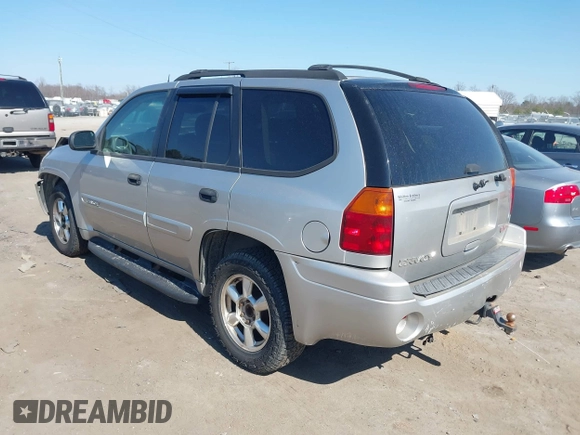 2005 GMC Envoy SLT with VIN 1GKDT13S952219826, listed as a IAAI auction lot 41783713 with 212,908 mi miles. Bid and sale history available at carsss.com. Image 3.