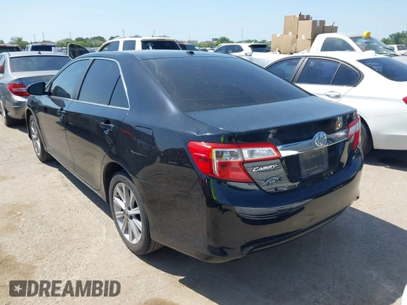 2014 Toyota Camry L with VIN 4T4BF1FK3ER413537, listed as a IAAI auction lot 42015577 with 181,592 mi miles. Bid and sale history available at carsss.com. Image 3.